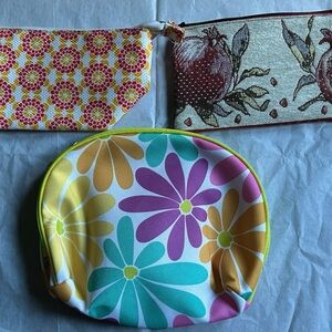 Three makeup travel bags: Clinique, Origins, and Armenian fabric, handmade